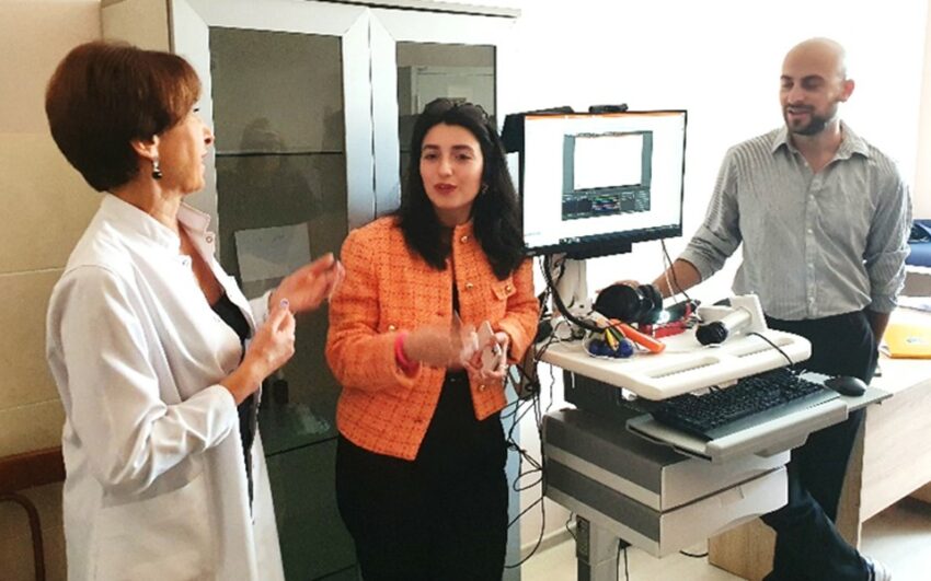 Clinicians demonstrate telehealth equipment in a health setting in Georgia